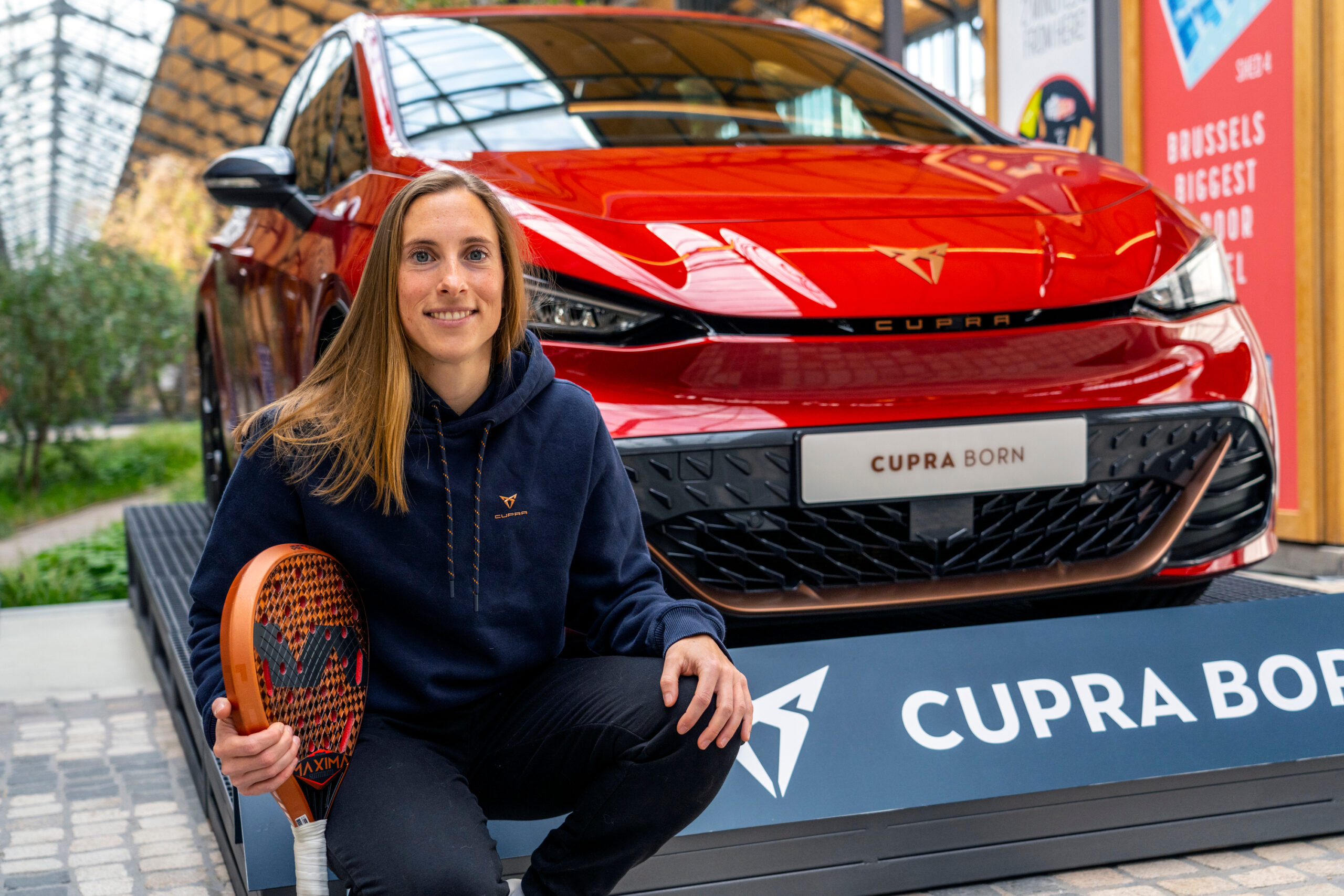 Elena in front of a cupra car